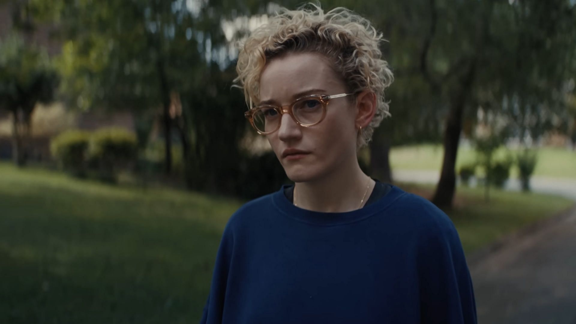 Julia Garner stars as Justine Gandy in Weapons 2025, a teacher caught in the center of the town’s tragedy after her students disappear without explanation. (Image via Warner Bros)